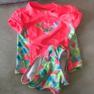 Cute Roxy swim suit with rash guard.
